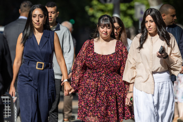 Elisheva (Elly) Sapper, Hadassa (Dassi) Erlich and Nehama (Nicole) Meyer arrive for a court hearing in Melbourne.