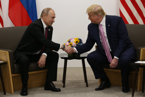 Vladimir Putin and Donald Trump meet during the G20 summit in Japan in 2019.