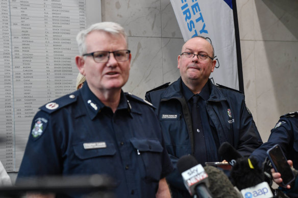 Former assistant commissioner Stephen Leane (front) with chief commissioner Graham Ashton. 