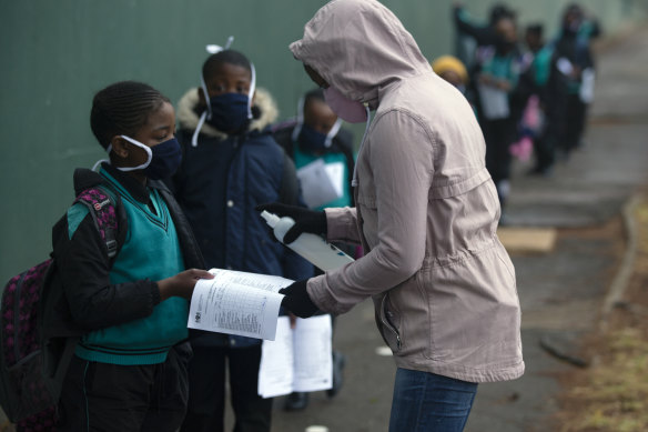 Students go through the regular morning checks on their arrival at the Melpark Primary School in Johannesburg, earlier this month. 