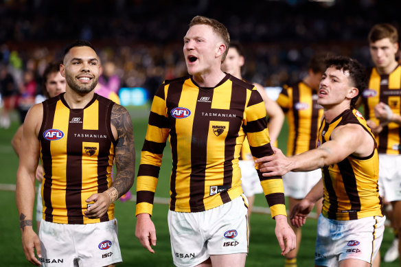 James Sicily of the Hawks reacts to Ken Hinkley, senior coach of the Power, after their semi-final match.