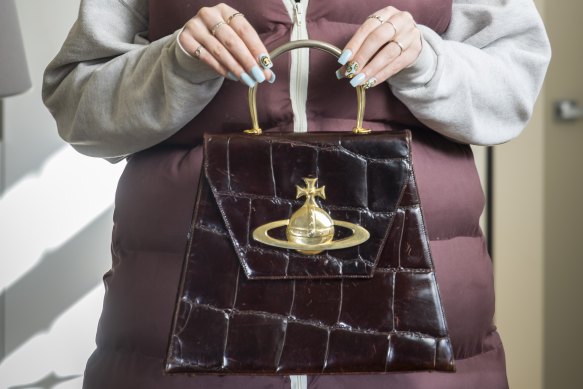 Ewing-Crellin purchased a brown faux-crocodile Vivienne Westwood bag valued at $1647 on luxury resale site, Vestiaire Collective.  