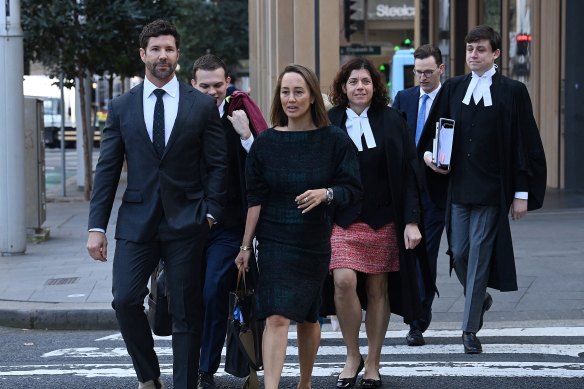 Former commando Heston Russell, far left, with his legal team outside the Federal Court in Sydney in August.