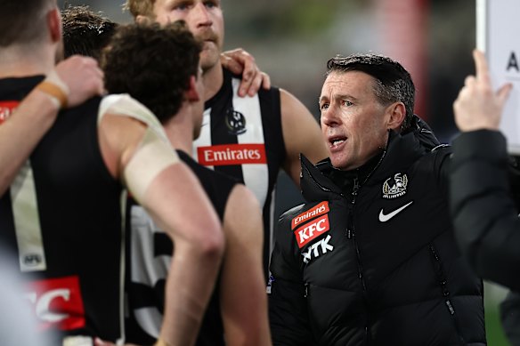 Craig McRae addresses his players.