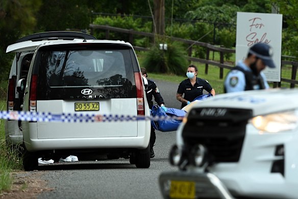 NSW Police forensic officers remove evidence from the Dural property.