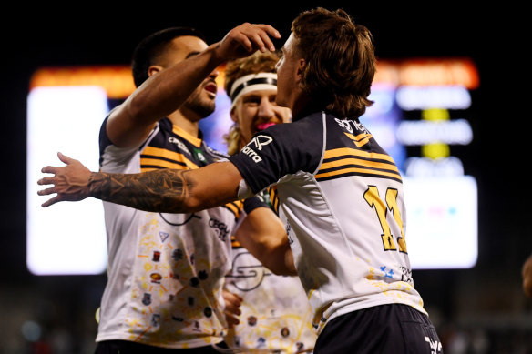 Corey Toole celebrates after scoring a try against the Wallabies.