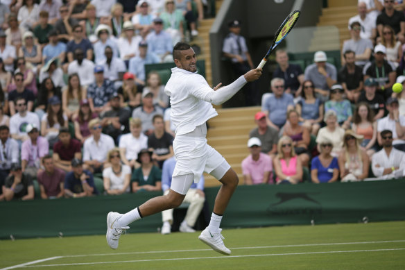 Nick Kyrgios returns to Australia's Jordan Thompson.