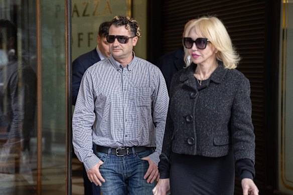 Anthony Koletti leaves Downing District Court with his lawyer, Zali Burrows.