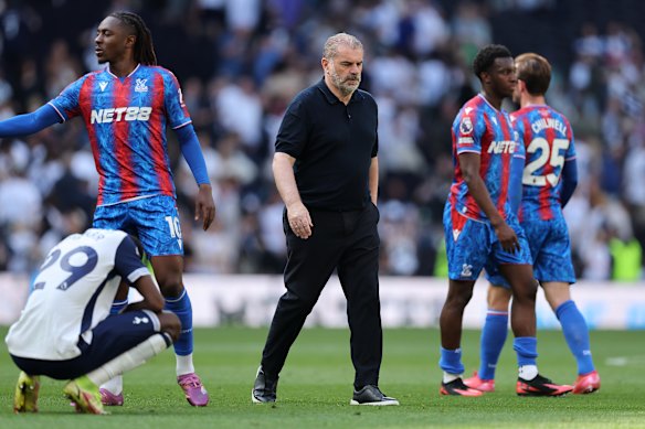 Ange Postecoglou walks on the field after the match between Spurs and Crystal Palace.