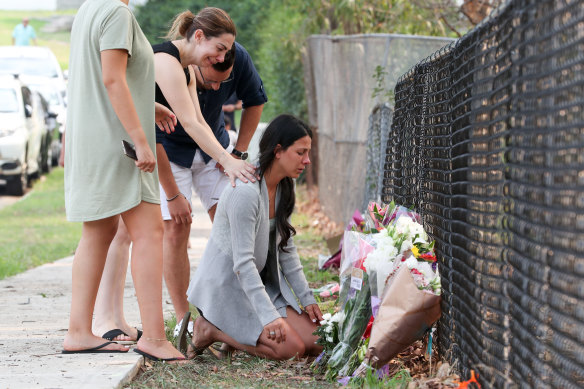 The Abdallah children's mother, Leila, at the scene of the collision on Sunday.