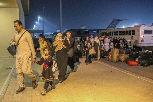 Evacuees from Afghanistan arrive at Al-Udeid airbase in Qatar’s capital Doha.
