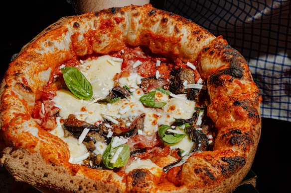The siciliana pizza is topped with eggplant and salted ricotta. 
