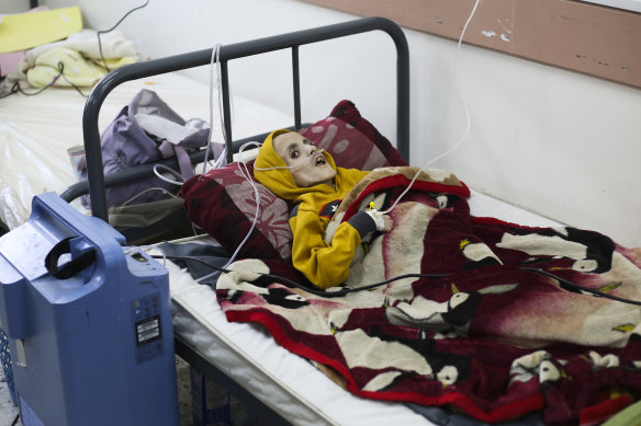 A 10-year-old Palestinian boy, Yazan Kafarneh, lies in hospital days before he died.