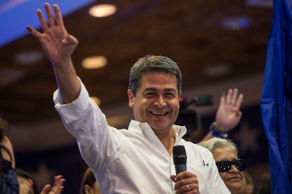 Drug kingpin 'El Chapo' tried to give $US1 million to Honduran President Juan Orlando Hernandez (pictured), a court has been told.