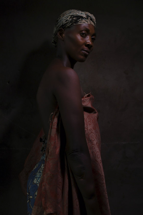 Naomiah Ngalula, 40, avoided becoming a slave only because she was left for dead: "Some of the people who attacked me were my neighbours. It was so heartbreaking to have them turn on us and for no reason."