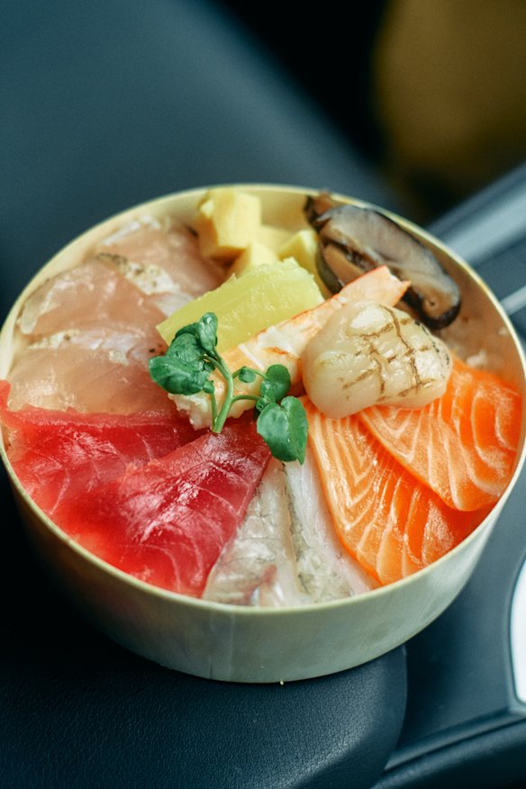 Moonfishh’s chirashi bowl is bright with torched scallops, tuna, salmon and snapper.