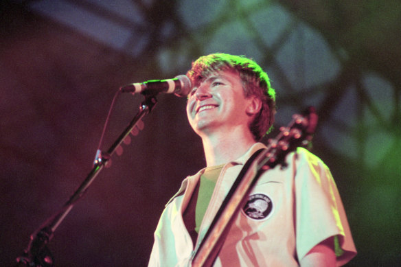 Neil Finn on stage in the short-sleeved shirt he had bought in Oxford Street that morning.