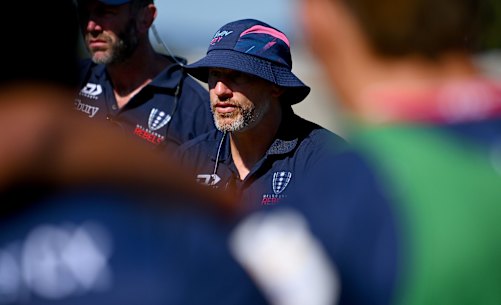 MELBOURNE, AUSTRALIA - FEBRUARY 03: Rebels head coach, Kevin Foote speaks to players during the Super Rugby Pacific Trial Match between Melbourne Rebels and NSW Waratahs at Harold Caterson Reserve on February 03, 2024 in Melbourne, Australia. (Photo by Morgan Hancock/Getty Images)