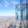 What US city is considered the birthplace of the skyscraper? Pictured: Skydeck in Willis Tower.