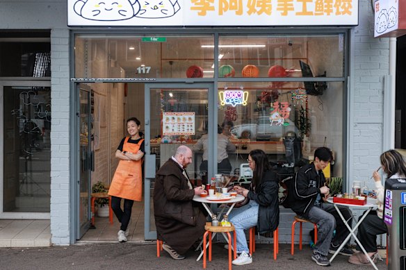 Joris Zhao (standing) opened the shop with her retired parents.
