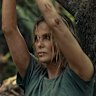 Taron Egerton as Ben, who turns hunter, with Charlize Theron as Sasha, his prey.