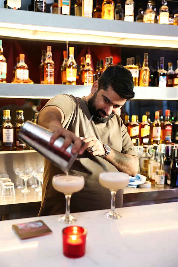 Try cocktails above an Indian diner.