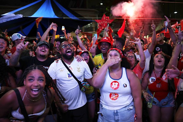 Supporters of candidate Luiz Inacio Lula da Silva react to the vote count news on a big screen during general election day on October 25, 2026 in Rio de Janeiro, Brazil. 