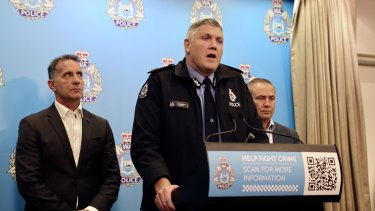WA Police Commissioner Col Blanch, flanked by WA Police Minister Paul Papalia and WA Premier Roger Cook during a press conference on Sunday morning.