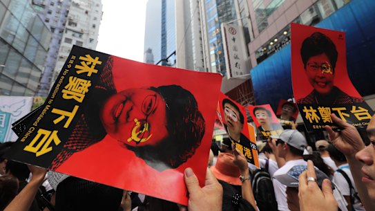 Protesters at the June 9 march with posters.