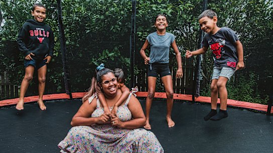 Portia Walker-Fernando at home in Casino with her children.