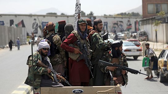 Taliban fighters patrol in Kabul, Afghanistan. 