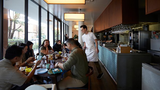 Yan’s dining room feels much cosier than the building it inhabits.