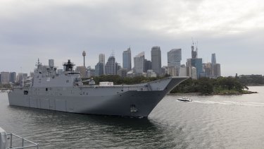 HMAS Adelaide on its way to Brisbane to be loaded with emergency supplies to take to Tonga.