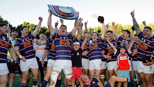 Easts celebrate victory in the Shute Shield grand final in 2024.