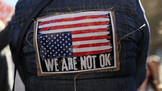  Demonstrators rally against US President Donald Trump and his recent policies in Trafalgar Square,  London, England.  