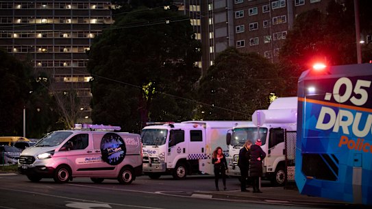 Police outside one of nine public housing towers in lockdown.