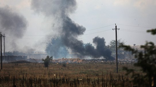 Smoke rises over the site of explosion at an ammunition storage of Russian army near the village of Mayskoye, Crimea.
