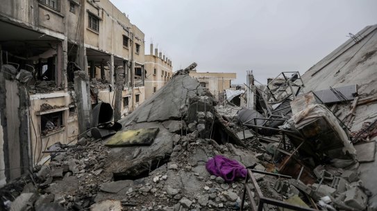 RAFAH, GAZA - FEBRUARY 27: People inspect damage and recover items from their homes following Israeli air strikes on February 27, 2024 in Gaza City, Gaza. As of Tuesday, 29,878 had been killed in Gaza since the start of the war on Oct. 7, according to the territory’s health ministry. Also this week, more details have emerged of a potential new ceasefire deal that could start before Ramadan, pending further negotiations by Israel, Hamas and foreign mediators. (Photo by Ahmad Hasaballah/Getty Images)