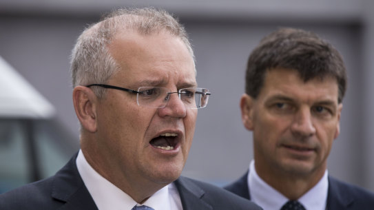Prime minister Scott Morrison and energy minister Angus Taylor say the QNI upgrade will lower power costs.