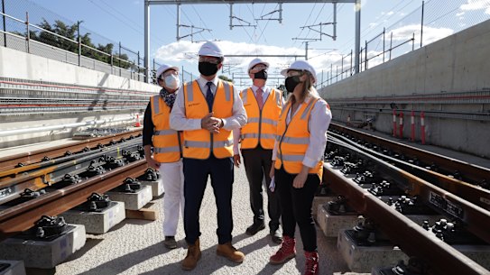 Premier Mark McGowan and Transport Minister Rita Saffioti (front) at the site of the new Perth to Bayswater airport link.