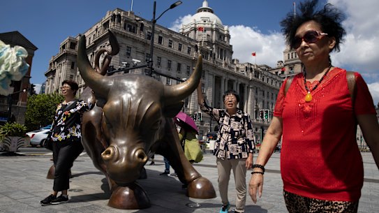 The Bund Bull in Shanghai, China’s financial centre. Wall Street banks are rushing in to China, but are still struggling to make money.