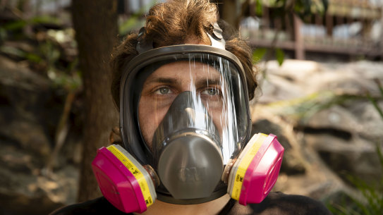 Adon Sammut, 28, from Menai has taken to wearing a P3 gas mask when outside on smoky days.