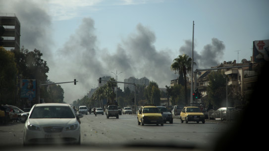 Smoke rises after an IDF strike reportedly targeted ammunition depots near Mezzeh Air Base in Damascus, Syria.