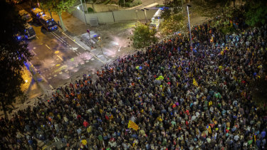 Pro-independence demonstrators gather next to the Interior Department in Catalonia., Spain.