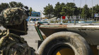 High alert. A US paratrooper monitors security during evacuations at Hamid Karzai International Airport in Kabul. 