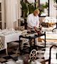 Sommelier Craig Cupido perfects a tea trolley.