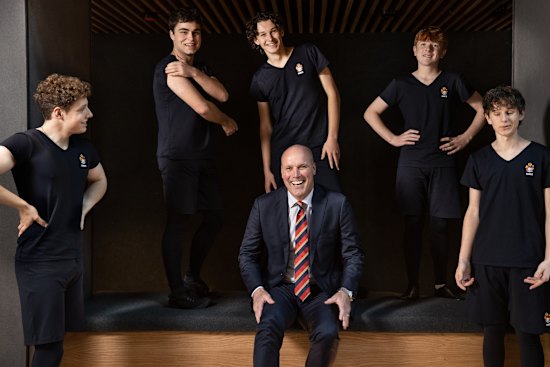 Brighton Grammar headmaster Ross Featherston with students who have opted to do dance as an extracurricular activity.