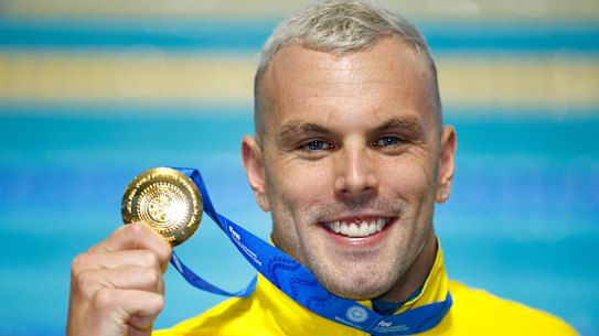 Kyle Chalmers shows off his gold medal after the men’s 100m freestyle final at the World Shortcourse Championships in Melbourne. 