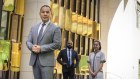 Hilton general manager Adrian Teh, bar manager Gee Shanmugan (centre) and housekeeper Marjorie Caro are glad to see tennis fans in the CBD.