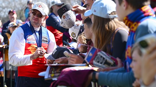 Lachie Neale signs autographs at Brunswick Street Oval on Sunday.